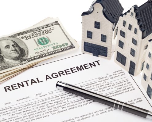 Kansas City House with rental agreement and cash Real estate investment and finance concept