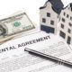 Kansas City House with rental agreement and cash Real estate investment and finance concept